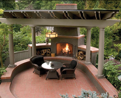 Completed outdoor fireplace with patio context