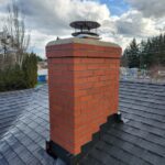 Chimney rebuild from the roof line up