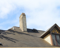A roof with a chimney.